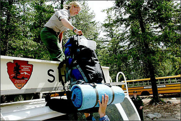 A Ranger In A National Park Is Driving At