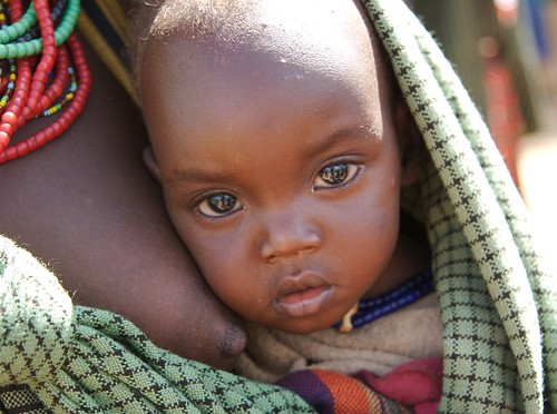 African Women Breastfeeding Animals