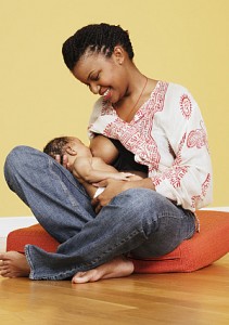 African Women Breastfeeding Animals