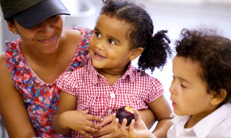 Parents And Children Playing Together