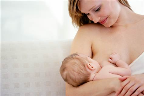 Women Breast Feeding To Husband